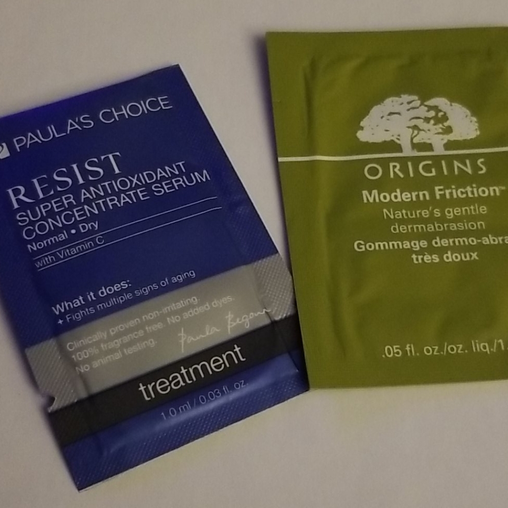 4/25 bundle item. Origins Dermabrasion, Paula's Choice Sample Packets